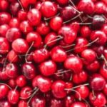 red cherries in close up photography